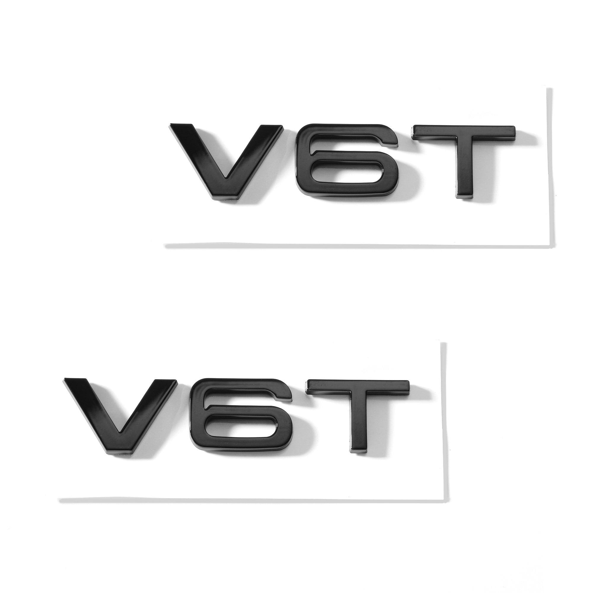 Set 2 embleme Audi V6T pentru aripi, Negru Lucios