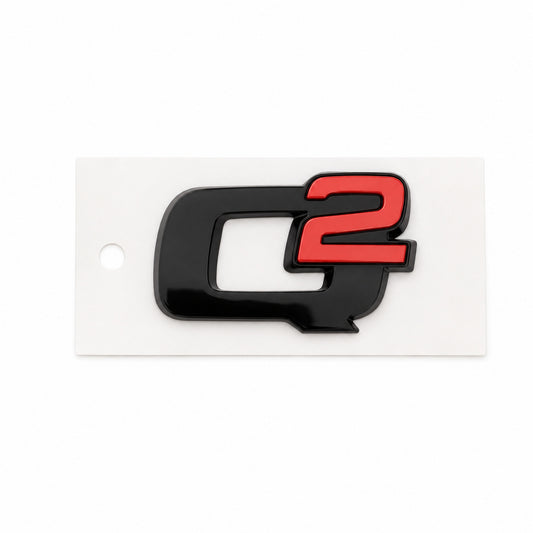 Emblema scris Q2