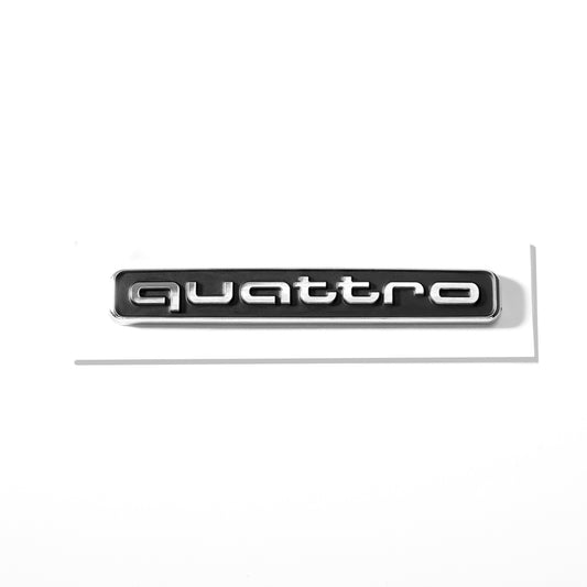 Emblemă Audi quattro pentru portbagaj / haion, Negru cu scris Crom