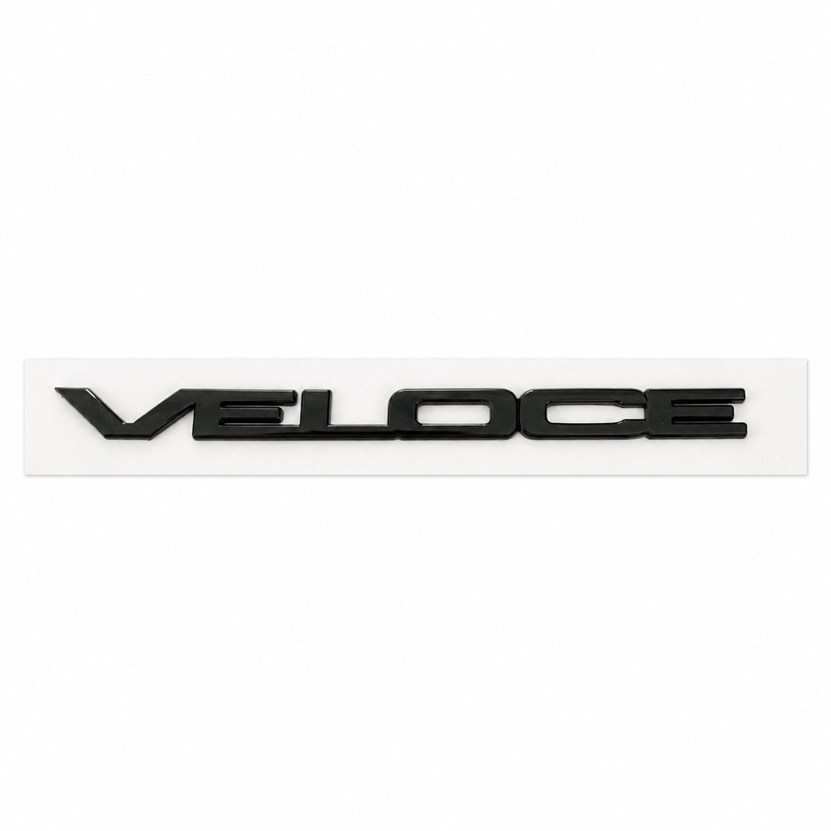 Emblema scris Veloce